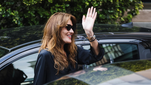 Former President of France Nicolas Sarkozy and his wife Carla Bruni arrive at the Teatro Dal Verme in Milan