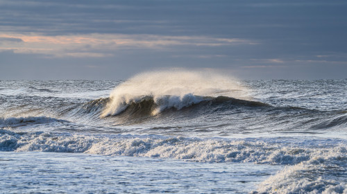 Waves,Crashing,At,Sunrise,In,Santa,Rosa,Beach,,Fl.