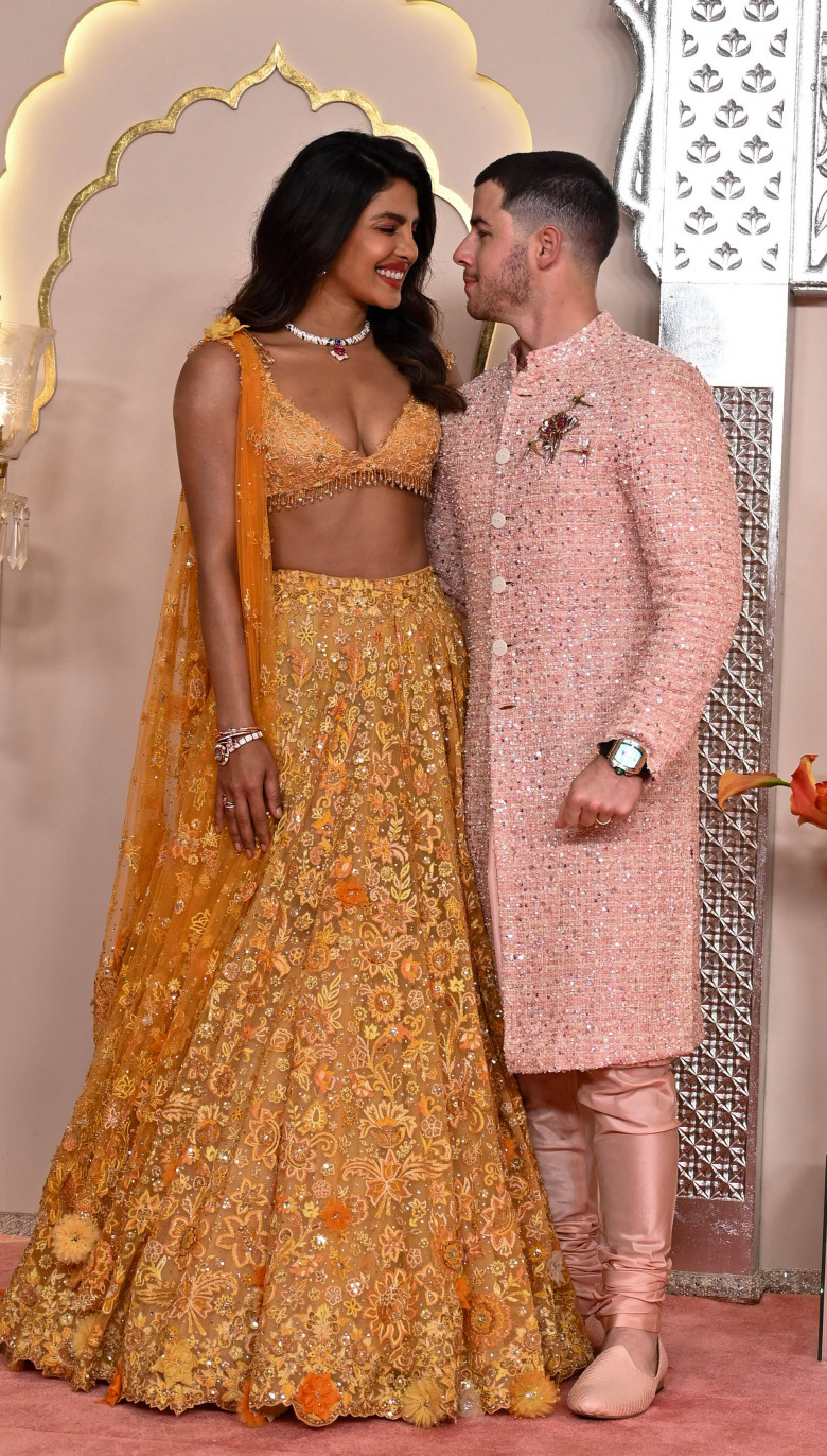 MUMBAI, INDIA - JULY 12: Indian actress Priyanka Chopra and husband Nick Jonas attending the Wedding ceremony of Anant A