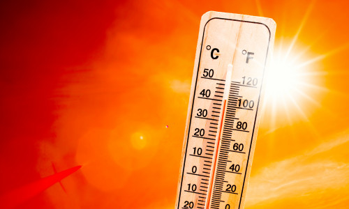 Orange,Sky,With,Bright,Sun,And,Thermometer,Symbolizing,Climate,Change