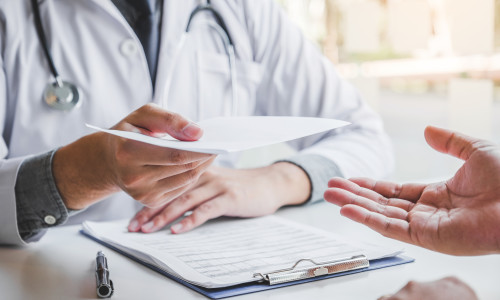 Doctor,Or,Physician,Writing,Diagnosis,And,Giving,A,Medical,Prescription