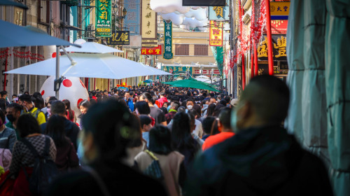 Macau,,China,,January,22,2023:,A,Crowd,Of,People,Flock
