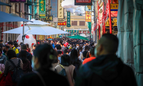 Macau,,China,,January,22,2023:,A,Crowd,Of,People,Flock