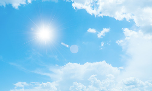Bright,Sun,And,White,Clouds,In,Clear,Blue,Sky,On