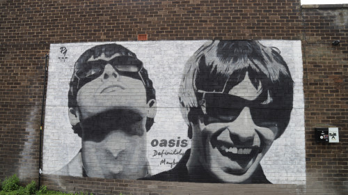 Oasis Superfan Travels From Madrid To Have Photo In Front Of Famous Mural Outside Sifters Record Shop - 27 Aug 2024