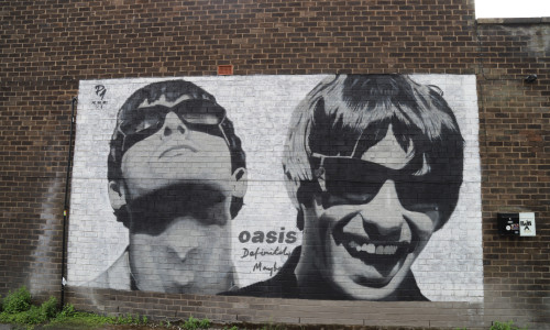 Oasis Superfan Travels From Madrid To Have Photo In Front Of Famous Mural Outside Sifters Record Shop - 27 Aug 2024