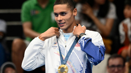 David Popovici of Romania attends the medal ceremony of the 200m Freestyle Men Final during the Paris 2024 Olympic Games at La Defense Arena in Paris (France), July 29, 2024. David Popovici placed first winning the gold medal.