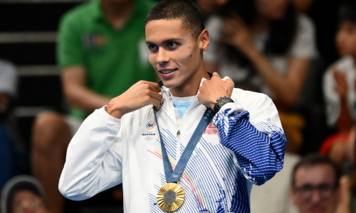 David Popovici of Romania attends the medal ceremony of the 200m Freestyle Men Final during the Paris 2024 Olympic Games at La Defense Arena in Paris (France), July 29, 2024. David Popovici placed first winning the gold medal.