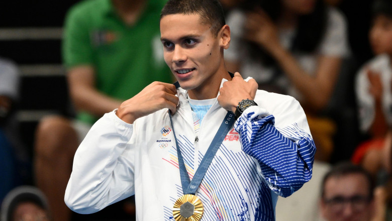 David Popovici of Romania attends the medal ceremony of the 200m Freestyle Men Final during the Paris 2024 Olympic Games at La Defense Arena in Paris (France), July 29, 2024. David Popovici placed first winning the gold medal.