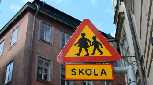 A,School,,Or,Skola,,Sign,In,An,Old,Neighborhood,Of