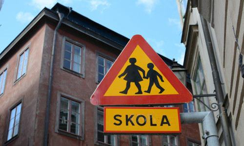 A,School,,Or,Skola,,Sign,In,An,Old,Neighborhood,Of