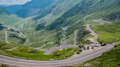 Aerial view from viewpoint of Balea Lake area on harpin turns of Transfagarasan Road in Fagaras Mountains (part of Carpathian Mountains), Romania