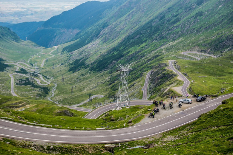 Aerial view from viewpoint of Balea Lake area on harpin turns of Transfagarasan Road in Fagaras Mountains (part of Carpathian Mountains), Romania