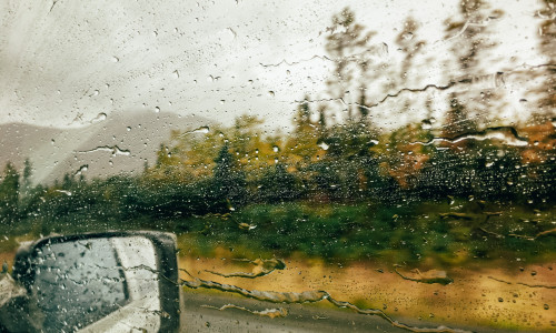 Looking,Out,Of,Car's,Window,On,A,Rainy,Day.