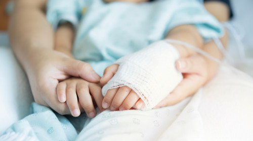 Closeup,A,Mother's,Hands,Holds,Her,Little,Son's,Hands,With