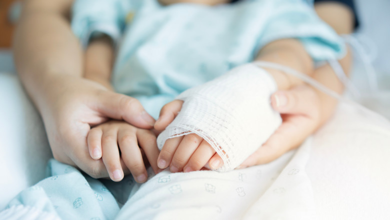 Closeup,A,Mother's,Hands,Holds,Her,Little,Son's,Hands,With