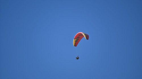 Skygliding,Outdoor,Activity,On,Clean,Blue,Sky