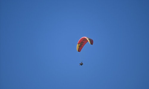 Skygliding,Outdoor,Activity,On,Clean,Blue,Sky