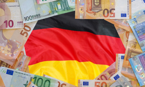 Macup,Of,Euro,Banknotes,On,The,Flag,Of,Germany,Background.