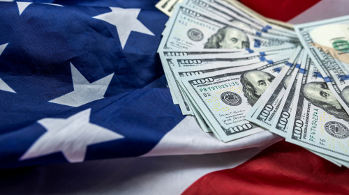 Close,Up,Of,American,Flag,And,Dollar,Cash,Money.,Concept