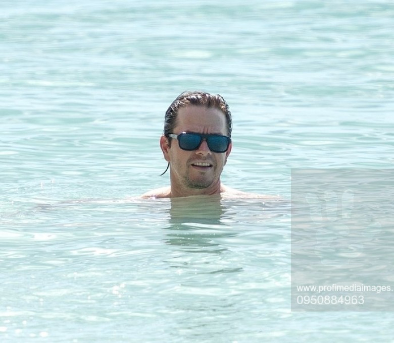 *PREMIUM-EXCLUSIVE* MUST CALL FOR PRICING BEFORE USAGE - Hollywood star Mark Wahlberg and his wife Rhea Durham continue their Christmas break on the sun-drenched Sandy Lane Hotel’s beach in Barbados.