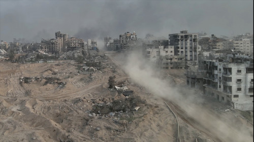 Tank,Driving,With,Dust,In,Al-shati,Refugee,Camp,,Gaza,,Aerial