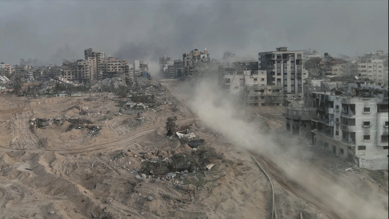 Tank,Driving,With,Dust,In,Al-shati,Refugee,Camp,,Gaza,,Aerial