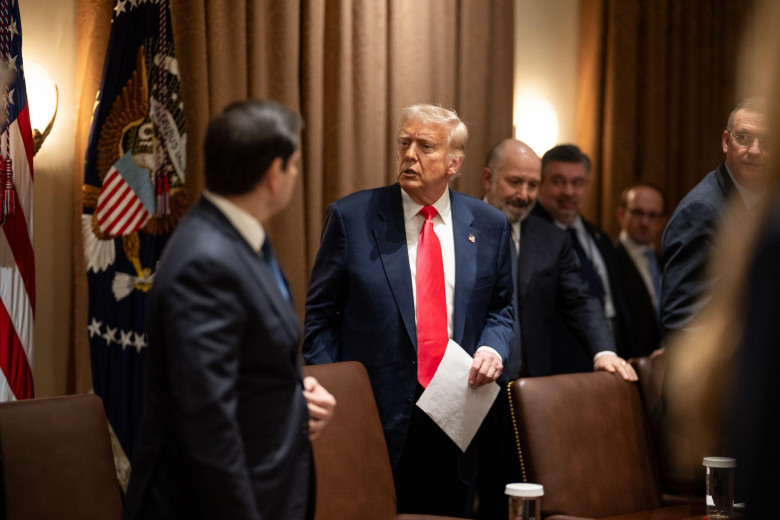 President Donald Trump speaks with Secretary of State Marco Rubio as he meets with his cabinet in the Cabinet Room of the White House, Thursday, March 6, 2025. (Official White House Photo by Daniel Torok)