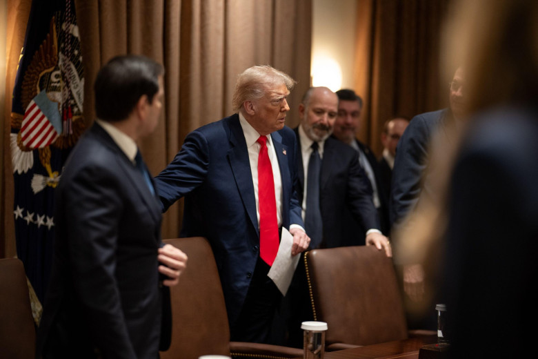 President Donald Trump speaks with Secretary of State Marco Rubio as he meets with his cabinet in the Cabinet Room of the White House, Thursday, March 6, 2025. (Official White House Photo by Daniel Torok)