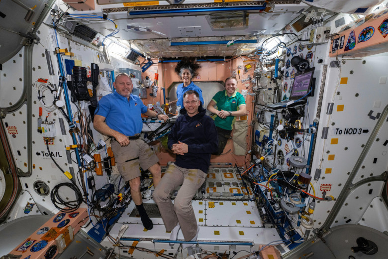 ISS - 19 February 2025 - NASA's SpaceX Crew-9 members pose together for a portrait inside the International Space Station's Unity module. Clockwise fr