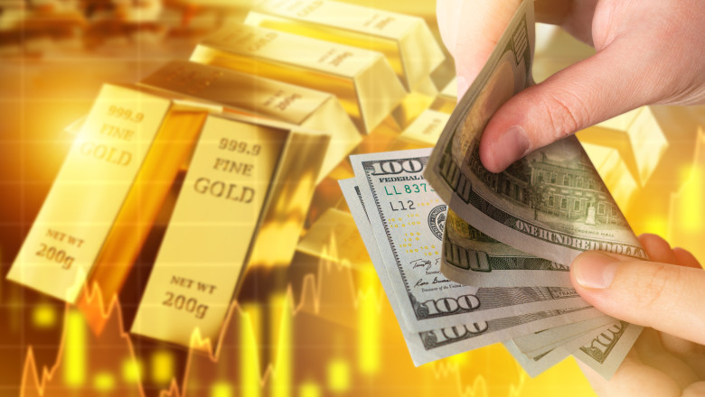 Rising,Gold,Prices.,Money,In,Hands,Of,Man.,Gold,Bars