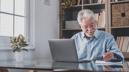 Happy,Old,Caucasian,Businessman,Smiling,Working,Online,Watching,Webinar,Podcast
