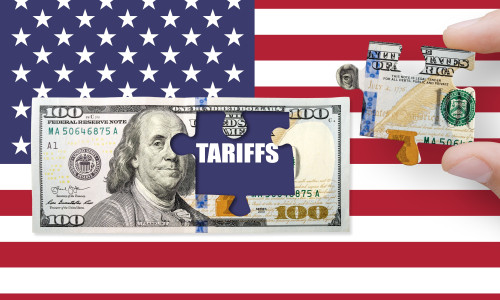 100,Us,Dollar,Note,On,A,Usa,Flag,With,Word