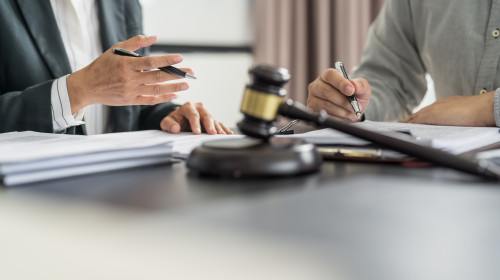 Lawyer,Legal,Counsel,Presents,To,The,Client,A,Signed,Contract