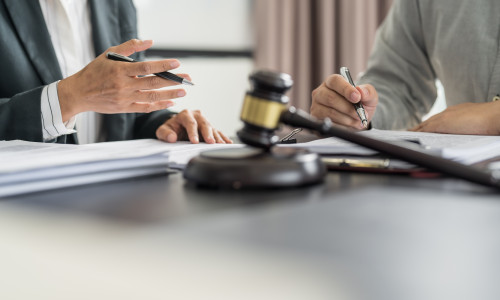 Lawyer,Legal,Counsel,Presents,To,The,Client,A,Signed,Contract