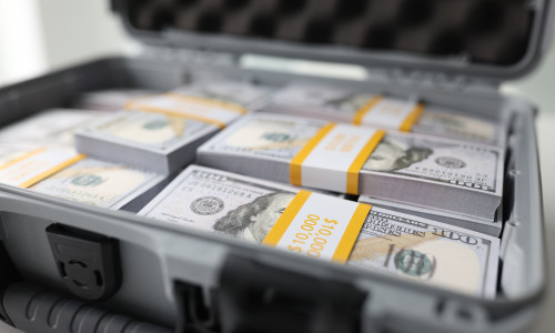 In,An,Open,Suitcase,Are,Packs,Of,Dollars,,A,Close-up.
