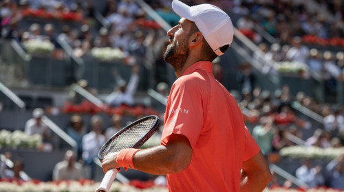 Serbian Novak Djokovic plays against Italian Matteo Arnaldi (not visible) during the second round match of the 2025 Mutua Madrid Open, held at La Caja Mágica. Final score: 6-3, 6-4 for Matteo Arnaldi.