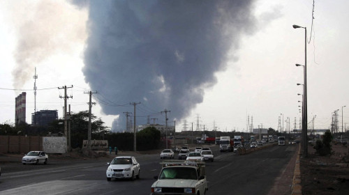 Smoke from the explosion is seen at the Shahid Rajaee port in Bandar Abbas