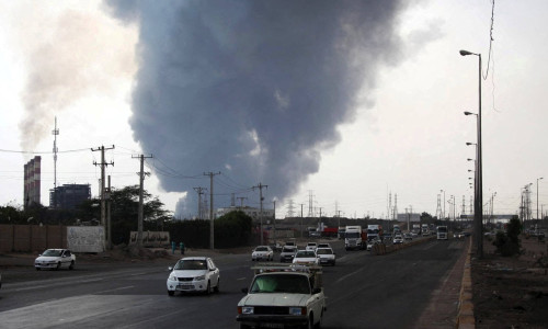 Smoke from the explosion is seen at the Shahid Rajaee port in Bandar Abbas