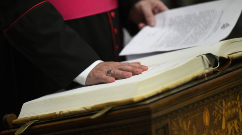 Officials and staff involved in the upcoming Conclave take the oath of secrecy in the Pauline Chapel of the Apostolic Palace at the Vatican on May 5, 2025 ensuring the integrity of the process to elect the new pontiff. The oath includes a solemn promise t