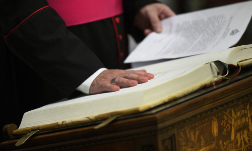 Officials and staff involved in the upcoming Conclave take the oath of secrecy in the Pauline Chapel of the Apostolic Palace at the Vatican on May 5, 2025 ensuring the integrity of the process to elect the new pontiff. The oath includes a solemn promise t