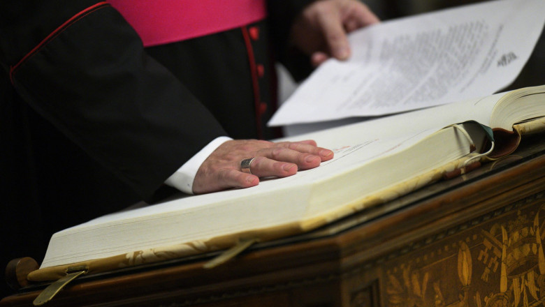 Officials and staff involved in the upcoming Conclave take the oath of secrecy in the Pauline Chapel of the Apostolic Palace at the Vatican on May 5, 2025 ensuring the integrity of the process to elect the new pontiff. The oath includes a solemn promise t