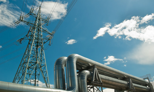 Pipeline,And,Power,Line,Support,,In,The,Photo,Pipeline,And
