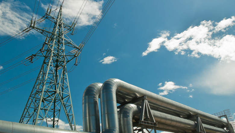 Pipeline,And,Power,Line,Support,,In,The,Photo,Pipeline,And
