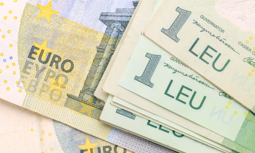 Close-up,Of,Mixed,Euro,And,Romanian,Leu,Banknotes.