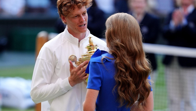 The Princess of Wales presents the Gentlemen's Singles Trophy to Jannik Sinner following his victory over Carlos Alcaraz on day fourteen of the 2025 Wimbledon Championships at the All England Lawn Tennis and Croquet Club, London. Picture date: Sunday July