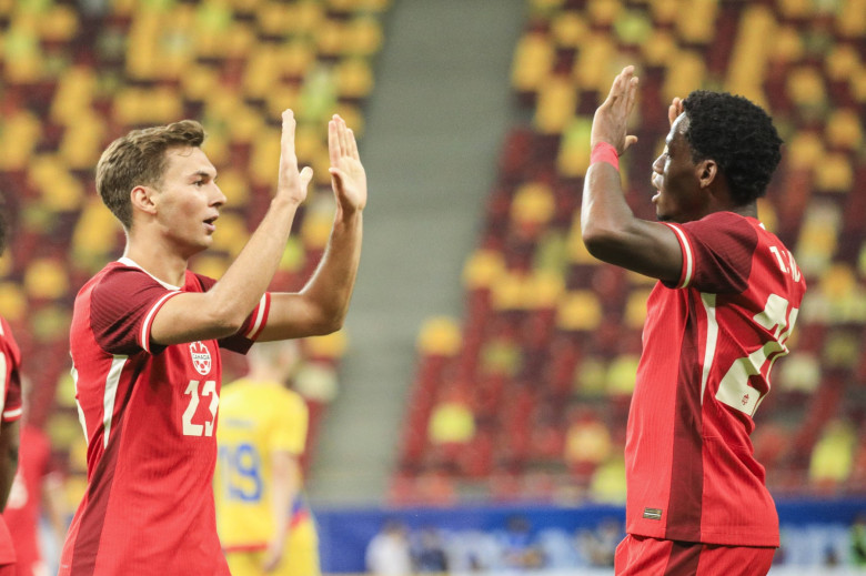 23 Niko Sigur celebrates scoring his first goal of the match with team mates