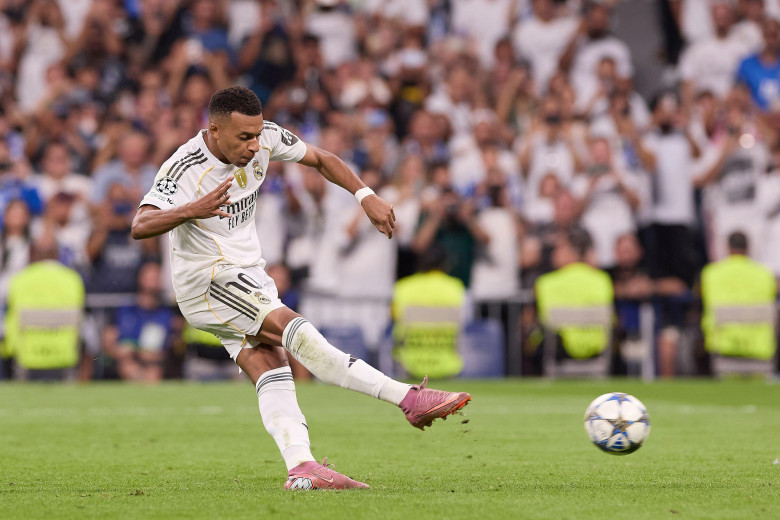 Kylian Mbappe of Real Madrid CF shoots a penalty during the UEFA Champions League 2025/2026 first round day 1 football match between Real Madrid CF and Olympique de Marseille at Santiago Bernabeu Stadium. Final score: Real Madrid CF 2 : 1 Olympique de Mar