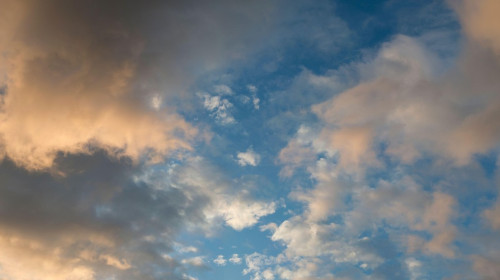 Orange Clouds Against Blue Sky