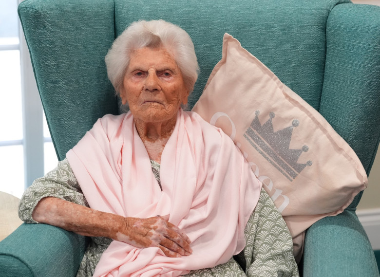 King Charles III meets world's oldest person